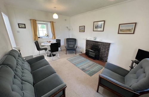 Lochgilphead House | Ellary Cottage - Cosy, Romantic Water-side Escape, Sleeps 2-4 open fire