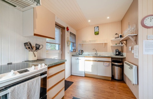 Corrie Cottage | Enjoy stunning sea views from this traditional cottage on the coast of Arran.