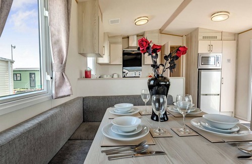 Kidwelly House | Gold Caravan with parking & sea view
