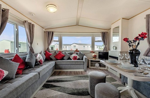 Kidwelly House | Gold Caravan with parking & sea view