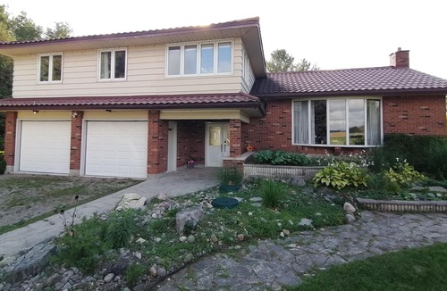 Dashwood House | Grand Bend Cottage. Private 26 acres of magical landscape & exclusive pond.
