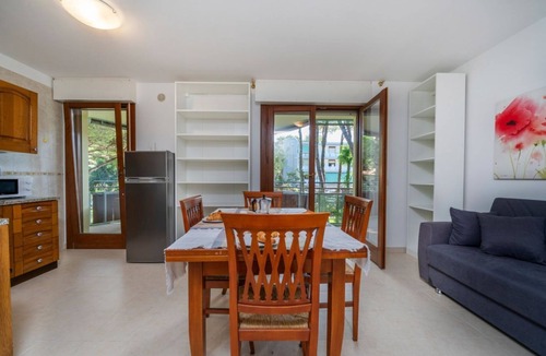 Lignano Riviera Apartment | GuestHost - Bright 55 sqm apartment, perfect for 4 people, located on the first floor of a building with a lift (stairs to access it). The accommodation is located in a quiet residential area surrounded by greenery and is equipped with every comfort incl