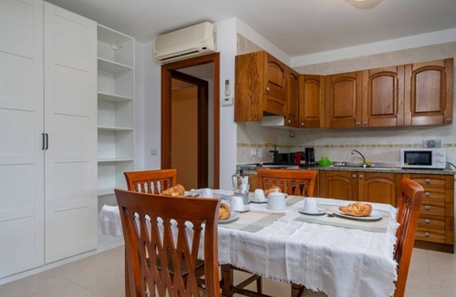 Lignano Riviera Apartment | GuestHost - Bright 55 sqm apartment, perfect for 4 people, located on the first floor of a building with a lift (stairs to access it). The accommodation is located in a quiet residential area surrounded by greenery and is equipped with every comfort incl