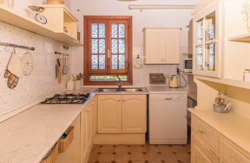 Pittulongu House | Holiday Home "Villa Rosa sul Mare" with Sea View, Terraces and Wi-Fi