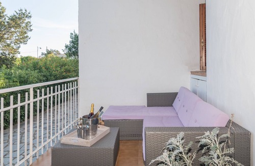 Pittulongu House | Holiday Home "Villa Rosa sul Mare" with Sea View, Terraces and Wi-Fi