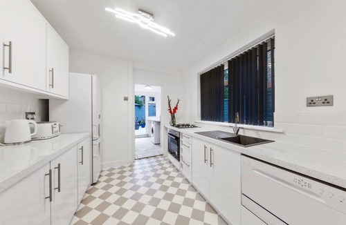 West Ham House | Home away from home with an indoor fireplace!