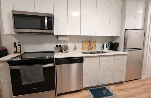 Kitchener Condo | Home In The Clouds | Downtown Retreat | Gym