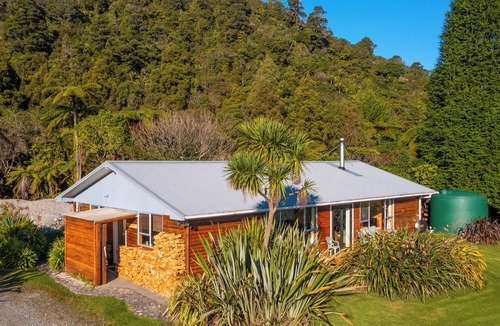 Mokihinui House | Home with stunning River and Ocean views. Pet-friendly
