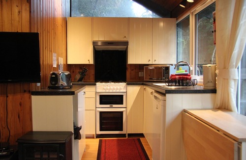 Taynuilt Cabin | KINGLAS CABIN is in a lovely, peaceful location deep in the forest, with hot tub