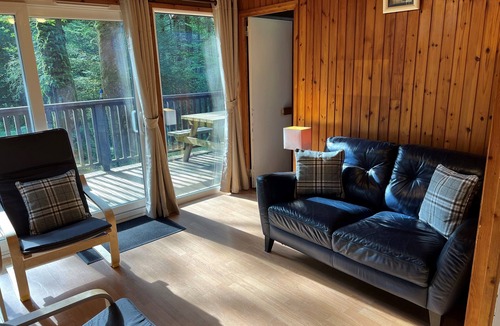 Taynuilt Cabin | KINGLAS CABIN is in a lovely, peaceful location deep in the forest, with hot tub