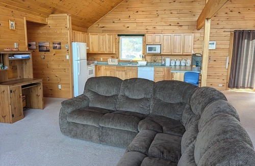 Eagle River Cabin | Lake front timber cottage amongst towering pines. Family and pet friendly