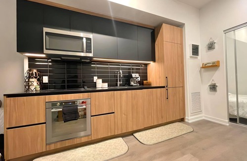 Leslieville Condo | Life's Wonder: 2 Bedroom 2 washroom Main level Historical Home Retreat With Terr