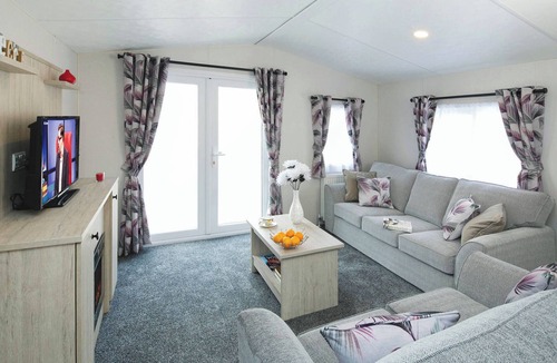 Golspie Ski Chalet | Luxury holiday home with two bedrooms sleeping four people.