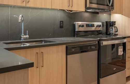 Waterloo Apartment | Modern 2-Bedroom Retreat Near Universities | Gym, Sauna & Theater
