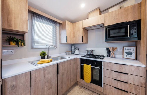 Golspie House | Modern, spacious holiday caravan with two bedrooms sleeping four people.