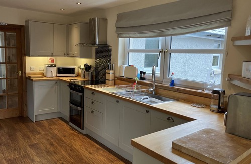 Fort Augustus Cottage | Oiseval is a pet friendly cottage with magnificent views.
