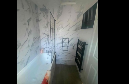 Woodhorn House | Patchwork house autism friendly with secure garden