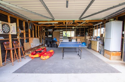 Pohara House | Poharadise - classic family bach near the beach, pet friendly