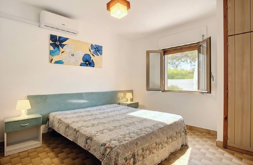 Chiesiola Resort | Property in a holiday village 'Baia Falcone-Bilocale 407' with sea view and air conditioning
