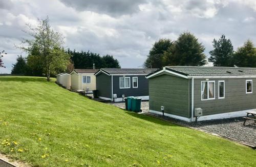 Stepps Resort | Red Deer Village Holiday Park - 3 Bedroom, Self Catering Static Caravan