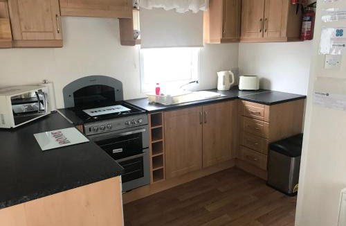 Stepps Resort | Red Deer Village Holiday Park - 3 Bedroom, Self Catering Static Caravan