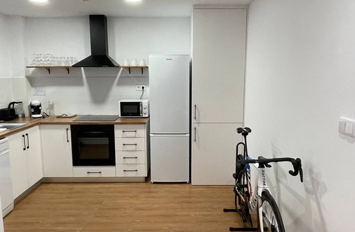 Can Gibert del Pla Apartment | Renovated apartment near Girona for families, couples, friends, and cyclists