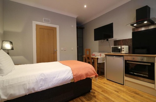 Airdrie Apartment | Signature - Linden Cottage Room 2