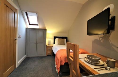 Airdrie Apartment | Signature - Linden Cottage Room 4