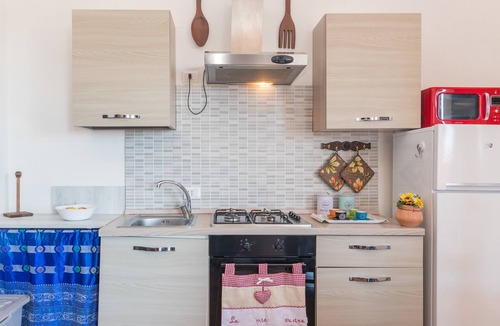 La Maddalena Apartment | Spacious Apartment with Hills View, Wi-Fi & Terrace