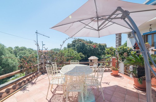 La Maddalena Apartment | Spacious Apartment with Hills View, Wi-Fi & Terrace
