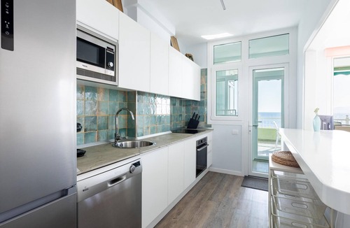 Radazul Apartment | Spacious beachfront apartment with communal pool