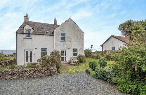Drummore Cottage | Spacious family cottage with open fire and garden overlooking the sea.