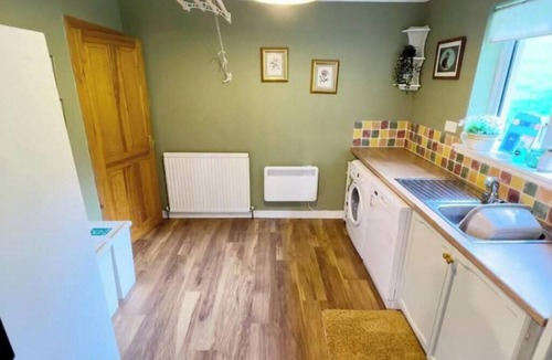Suladale House | Spacious Family Retreat with Stunning Loch Views near Portree