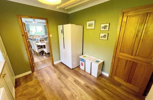 Suladale House | Spacious Family Retreat with Stunning Loch Views near Portree