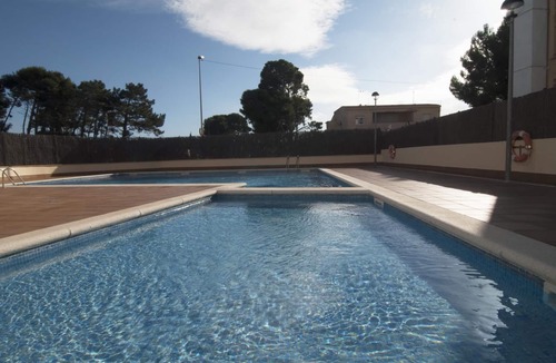 L'Escala Apartment | Spectacular apartment with communal pool and views of the port