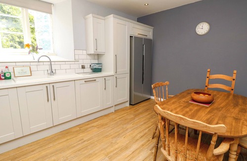 Godshill Cottage | STABLE COTTAGE, pet friendly, with a garden in Wroxall