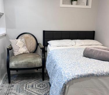 Milton Apartment | Studio Basement Suite with Double Bed and kitchen, Entrance from Garage