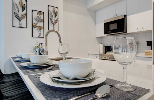 Kitchener Condo | Stylish Downtown Suite with Patio & City Views