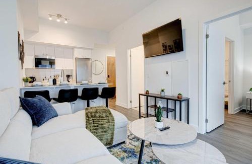 Kitchener House | Stylish Downtown Suite with Patio & City Views