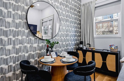 Grange Park Apartment | The McCaul | Cozy Queen Suite Near MAJOR INTERNATIONAL SPORTING EVENT 2026
