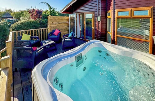 Raywell Ski Chalet | This deluxe two bedroom lodge even has its own games den.