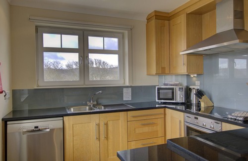 Brora Apartment | Top-floor, two-bedroom golf apartment with views over the famous James Braid Brora Golf Course