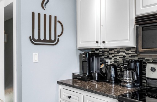 Riverside House | TOP Rated Home: Cozy & Spacious Family Home w/Fireplace, Sunroom and Heated Pool
