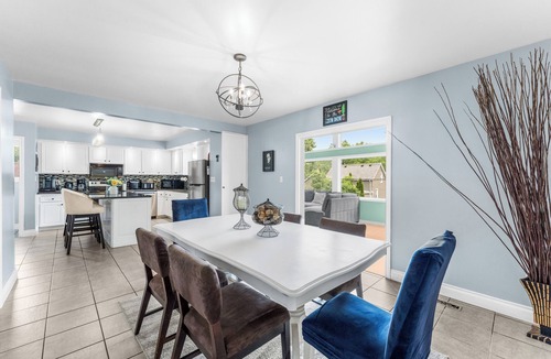 Riverside House | TOP Rated Home: Cozy & Spacious Family Home w/Fireplace, Sunroom and Heated Pool