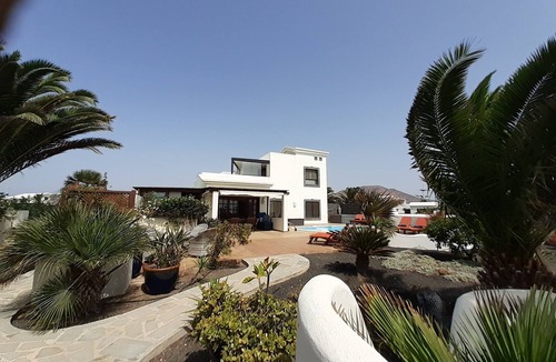 Montana Roja Villa | Tranquil setting, sea view, heated pool & Hot Tub, sub-tropical garden.