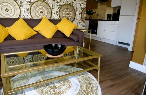 Rotherham Apartment | Versace Gold Apartment Opulence