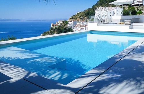 Almadraba-Canyelles Villa | Villa Bianca, luxury overlooking Canyelles petites beach. Heated pool