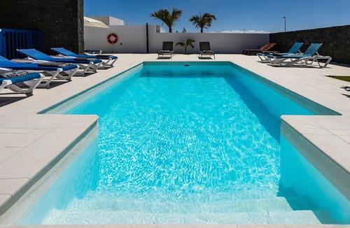 Playa Blanca Villa | Villa Carmen Heated Private Swimming Pool, Air Conditioning and Game Room all in