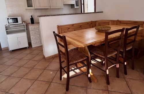 Porto Pino Apartment | Villetta 'Rocco' with Private Terrace, Garden, and Air Conditioning