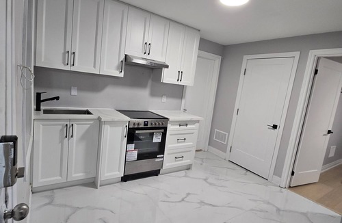 Niagara Falls Apartment | Walk to the Falls! 2BR Modern Home Base + Free Parking & Laundry